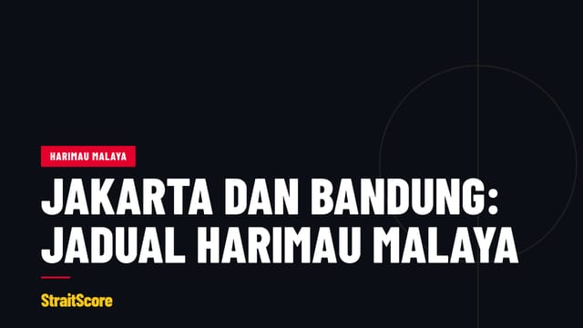 Penyokong berbaju warna kebangsaan memenuhi bahagian stadium sebelum perlawanan antarabangsa.